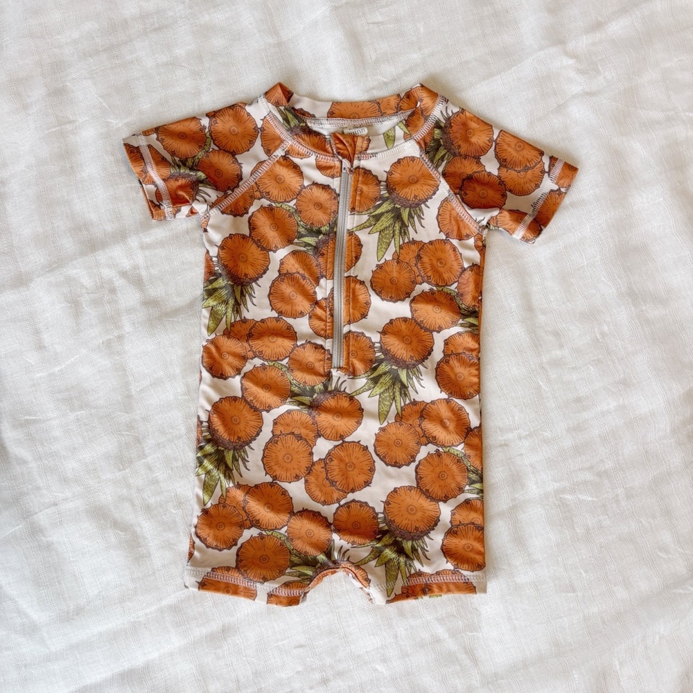 Kate Quinn Warm Vintage Pineapple Short Sleeve Zip Front Rash Guard Shortie